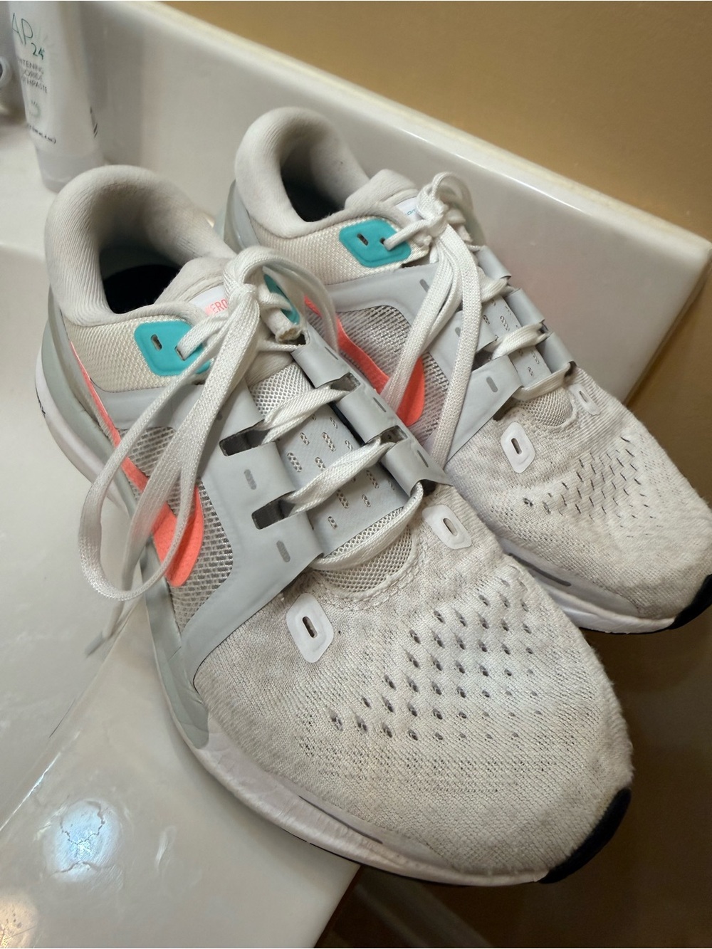 Nike Women’s White Running Shoes with Coral and Teal Accents